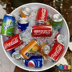 a bucket filled with soda cans and ice