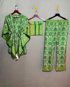 "kgncraft presenting this set of Indian Art Silk sari pajamas made up of a short kaftan, which is decorated with handmade stitches, and loose-fitting pants with an elastic waist, button detail. it can be worn at home and out. Art Silk fabric , floral printed night suit, it is done differently. it's not just nightwear, ideal for staying at home, sleeping, but also for lounge time and even parties. Short kftan and loose fit trousers / pants . with the holiday season just around the corner, it's th Silk Pajama Sets, Bridesmaid Pajama, Bridesmaid Pajama Set, Short Kaftan, Loose Fitting Pants, Fitting Pants, Bridesmaid Pyjamas, Personalized Pajamas, Silk Pajama