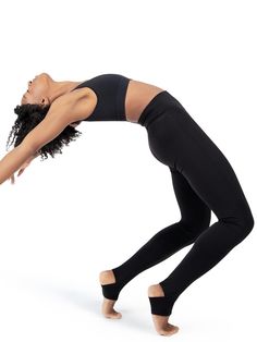 High Rise Stirrup Legging for Active LifestylesInspire your best performance in our high waisted Stirrup Legging. Made of a nylon and spandex combination that is both soft and resilient. Can be worn over dance shoes or left as is to create a bold cut-out detail on your calves. Easily translates from studio to daily wear. Product Features: Basic legging with stirrup    90% Nylon 10% Spandex High rise waist Medium inseam length: 33    Recommended care: Machine wash cold delicate cycle and hang dry Fitted Dancewear Tights For Yoga, Fitted Yoga Tights For Dancewear, High Stretch Black Legwear For Yoga, Black High Stretch Legwear For Yoga, Black Flexible Legwear For Yoga, Fitted Black Bottoms For Barre, Compression Dancewear Bottoms For Barre, Stretch Black Dancewear Bottoms, Compression Black Bottoms For Barre