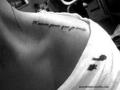 the back of a woman's shoulder with an inscription on it that says, i love