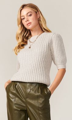 Soft and cozy, our Francis knit top is knitted from a marled rib knit in a neutral grey/taupe shade. It has a medium weight to the touch. Crew neckline with short sleeves, has ample stretch and it's meant to fit slim and easy. Length from shoulder to hem: 22 1/2" Across chest: 15 1/2" Sleeve length: 12 3/8“ imported 70% Acrylic / 16% Angora / 6% Nylon / 2% Spandex Style #: G106W5617 Knit Short Sleeve Top, Short Sleeve Knit Top, Knit Short, Knit Tops, Sweaters Knitwear, Knit Shorts, Ribbed Sweater, Fall Looks, Sweater Weather