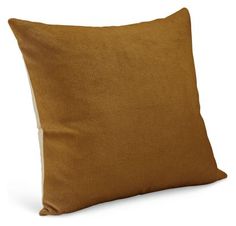 a brown pillow on a white background