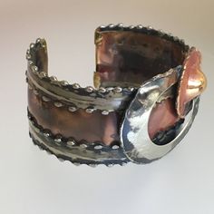 "This phenomenal bracelet was likely an artisan piece made in the 1980s. It is fabricated of copper and pewter, and the unique design makes such incredible impact! A true one-of-a- kind statement piece! SPECIFICS: Width: 1.25\" Weight: 43.4 grams Interior Circumference: 7.25\" including 1\" gap Excellent Condition Unsigned" Filigree Necklaces, Wide Cuff Bracelets, Modernist Jewelry, Wide Cuff, Antique Earrings, The 1980s, Drop Pendant, Mixed Metals, Vintage Diamond