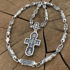 "1️⃣ Silver Orthodox chain with the image of saints Art. 0222. ✔️Silver 925 with blackening ✔️Weight 123 grams ✔️Lenght 65 cm ✔️The faces of saints are depicted on the chain: 🔘 Panteleimon the Healer 🔘 Virgin Mary 🔘 Nikolai the Wonderworker 🔘 Jesus Christ 🔘 Holy Matrona 🔘 Serhiy Radonezhsky 🔘 Cherub ✔️Box lock with the inscription \"God Save and Protect\" ✔️Possible to make any length! 2️⃣ Silver Orthodox cross Art. 0108 ✔️ Silver 925 with blackening. ✔️Weight 50 grams ( +-) ✔️Size: 70/32 Chain With Cross, Cross Accessories, The Healer, Mens Cross Necklace, Orthodox Cross, Crucifixion Of Jesus, Cross Necklaces, Cross Art, Mens Crosses