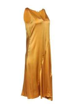 A true closet essential, this gold slip dress by Vince is an all-purpose style. Crafted from smooth silk with a v-neck, it stands alone or can be paired with a range of tops: blazers, jackets, and oversized sweaters. Wear it all year-long and pack it for travel as it's truly perfect for any occasion! Size S 100% Silk Sleeveless Slip style V-neck Bias cut Bust 36" Waist 35" Shoulder to hem 45.5" Gold V-neck Slip Dress For Spring, Elegant Gold V-neck Slip Dress, Chic Gold Sleeveless Slip Dress, Gold Satin V-neck Slip Dress, Gold Sleeveless Slip Dress For Evening, Gold Sleeveless Silk Slip Dress, Gold Fitted Silk Slip Dress, Gold Slip Dress For Night Out In Spring, Gold Fitted V-neck Slip Dress