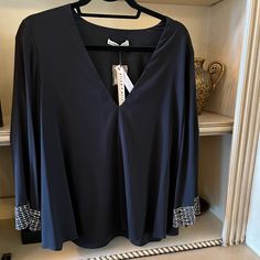 Brand New, Elegant Blouse. Black Silk With Beaded And Metallic Flared Long Sleeves. Retails For $440 For The Low Price Of $440. Drapes Beautifully. Elegant V-neck Top For Night Out In Spring, Formal V-neck Blouse For Fall, Chic Split Neck V-neck Top For Work, Elegant Split Neck V-neck Top For Spring, Elegant V-neck Top For Fall Parties, Elegant Fitted Split Neck Blouse, Elegant Long Sleeve V-neck Top For Night Out, Elegant V-neck Top For Date Night, Elegant Fitted Top With Split Neck