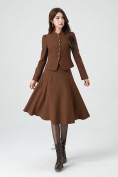 The brown midi wool skirt crafted to the highest standards of quality and design.  This exquisite  a line wool skirt is tailored to perfection, ensuring a snug yet elegant fit that exudes sophistication and style. DETAIL * 30% wool, 30% fiber, 40% polyester * Fully satiny lining, more nice to the touch body * No pockets * Right zipper closure * Midi wool skirt * A line skirt * High waist skirt * Party skirt * For autumn and winter * Dry clean * Lean More about the items From the FAQs on the page Cloak Dress, Skirt Winter, Skirt A Line, Skirt Elegant, Summer Coats, Wool Winter Coat, Handmade Skirts, Brown Skirt, Party Rock