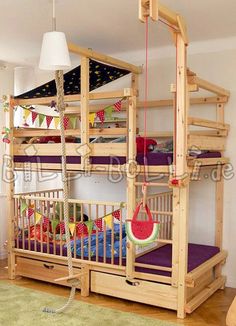 a wooden bunk bed sitting next to a green rug