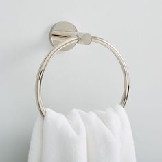 a towel ring is hanging on the wall