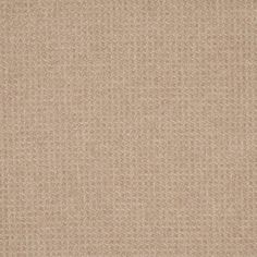 a beige fabric textured with small circles