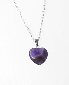 "Genuine Amethyst Gemstone Heart Necklace. Beautiful natural Amethyst heart necklace, choice of chain length. Heart pendant measures approximately 20mm. ☆ Amethyst ☆ The birthstone for February, represents health, luck and humour. ♥ Encourages self-control. ♥ Brings stability. ♥ Calms harsh emotions. ♥ Aids meditation and sleep. ♥ Maintains equilibrium. To see our full range of jewellery please click here: https://www.etsy.com/uk/shop/WishKnotsJewellery  ☆ Chain Options ☆ ♡ Silver Plated Chain - Purple Amethyst Heart Necklaces, Heart-shaped Amethyst Necklaces As Gifts, Purple Heart-shaped Amethyst Necklaces, Heart-shaped Amethyst Necklace For Gifts, Purple Amethyst Heart Necklace, Heart-shaped Amethyst Necklace For Valentine's Day, Purple Heart Amethyst Necklace, Purple Amethyst Heart Pendant Necklace, Amethyst Gemstone Necklace For Valentine's Day