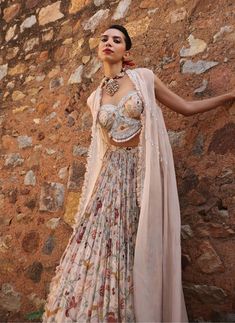 Dive into elegance with this ensemble: an embellished printed choli paired harmoniously with an embellished cape and a printed circular skirt. This ensemble captures attention with its intricate detailing and vibrant prints, offering a perfect blend of tradition and contemporary style. Ideal for weddings, festive celebrations, or cultural events, it promises to make a striking statement. Cape Set, Circular Skirt, Printed Lehenga, Cultural Events, Vibrant Prints, Minimal Fashion, Pink Print, Indian Outfits, Lehenga