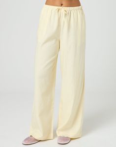 These tie waist pants feature a relaxed leg style and a mid rise fit. Loungewear Bottoms With Tie Waist And Straight Leg, Wide-leg Workwear Bottoms With Tie Waist, Wide-leg Workwear Pants With Tie Waist, Wide-leg Tie Waist Pants For Work, Workwear Wide-leg Pants With Tie Waist, Chic High-waisted Tie Waist Pants, Chic High-waisted Pants With Tie Waist, Straight Leg Pants With Tie Waist For Loungewear, Relaxed Bottoms For Spring Day Out