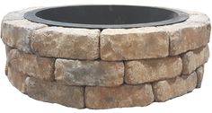 an outdoor fire pit made out of stone