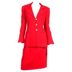 Designer David Hayes made some truly beautiful well tailored suits with sublime details! This luxe wool vintage red suit includes a blazer jacket with huge rhinestone buttons, pockets and pretty flared cuffs on the sleeves. The simple pencil skirt closes in back with a zipper and a pair of hooks and eyes. This suit was purchased at Saks Fifth Avenue in the 1990's and is so versatile. You can wear the jacket with a pair of black or winter white trousers and you will have totally different looks.T White Pants Winter, Handmade Pants, White Trousers, Beautiful Suit, Vintage Suits, Red Suit, Red Skirt, Red Skirts, Tailored Suits