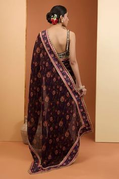 Purple saree with floral digital print and lace embroidered border. Paired with beads and mirror embroidered black sleeveless blouse and solid petticoat. - Aza Fashions Traditional Sleeveless Chanderi Pre-draped Saree, Traditional Embroidered Sleeveless Pre-draped Saree, Festive Sleeveless Embroidered Pre-draped Saree, Traditional Sleeveless Saree For Reception, Saree And Sleeveless Blouse, Floral Digital Print, Purple Saree, Black Sleeveless Blouse, Embroidered Saree