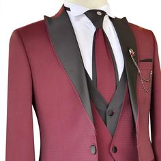 Package Includes: 1 x Jacket - 1 x Waistcoat - 1 x Pant

Upgrade your formal wear collection with the custom maroon and black tuxedo. Choose to purchase it as is or personalize it to your specific preferences and measurements using the options below. Our experienced digital tailoring team will work closely with you to ensure a perfect fit and design that meets your expectations. Shop now to add a touch of sophistication to your wardrobe.

 	Fabric: 120s
 	Lining Fabric: Silk
 	Pattern: Dotted Te Fitted Outerwear With Suit Collar For Black Tie Event, Winter Black Tie Tuxedo Suits, Elegant Custom Fit Red Suit, Elegant Red Custom Fit Suits, Elegant Burgundy Outerwear For Party, Elegant Burgundy Party Outerwear, Winter Black Tie Tuxedo With Notch Lapel, Elegant Winter Blazer For Black Tie Events, Tuxedo Blazer For Black Tie Winter Events