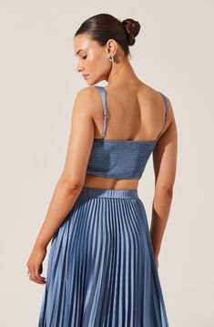 Satin pleated crop top Partially lined at front of bust Elasticized back, adjustable straps Pull on style Self: 95% Polyester, 5% Elastane / Lining: 100% Polyester Dry clean only Style #ALT20426 Blue Pleated Summer Tops, Blue Pleated Tops For Summer, Chic Blue Crop Top With Adjustable Straps, Spring Blue Crop Top With Straps, Chic Blue Spaghetti Strap Crop Top, Chic Blue Crop Top With Spaghetti Straps, Spring Blue Crop Top With Adjustable Straps, Blue Crop Top With Adjustable Straps For Spring, Blue Adjustable Straps Crop Top For Spring