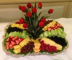 a table topped with lots of different types of cakes and desserts next to each other