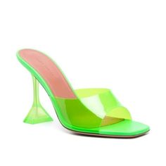 The Lupita Model Is An Amina Muaddi Icon, With This Iteration Being Defined By Its Glassy Quality, Crafted From Acrylic Glass And A Clear Pvc Toe Strap. The Pair Is Set Atop The Brand's Signature Martini Heel A Part-Stiletto, Part-Flared Support With 95mm. Made In Italy Highlights Fluorescent Green Calf Leather Transparent Strap Open Square Toe Branded Footbed 95mm Transparent Sculpted Heel Slip-On Style Composition Outer: Pvc 100% Lining: Calf Leather 100% Sole: Calf Leather 100%, Rubber 100% S Cocktail Heels With Reinforced Heel, Modern Green Sandals For Party, Spring Cocktail Heels With Reinforced Heel, Luxury Green Heels For Cocktail, Fitted High Heels For Fashion Events, Fashion Event High Heels, Modern Green Heels With Contrasting Heel Counter, Green Pointed Toe Sandals For Cocktail, Designer Green Sandals For Party