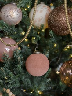 a christmas tree with ornaments hanging from it