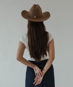 From coffee dates to country music festivals, the Teddy Cattleman Hat has you covered. With a true Cattleman crown + wide Western brim, this classic Western hat is sure to stand out in a crowd. Make your Cattleman hat our own by adding one of our Western hat bands - sold separately. Fitted Felt Hat With Curved Brim For Rodeo, Western Hat With Curved Brim, Vintage Fitted Felt Hat For Ranch, Fitted Felt Hat With Curved Brim For Country Events, Country Style Fitted Felt Hat With Curved Brim, Rodeo Brimmed Fedora, Western Wide Brim Felt Hat For Kentucky Derby, Western Style Wide Brim Felt Hat For Kentucky Derby, One Size Brimmed Fedora For Rodeo