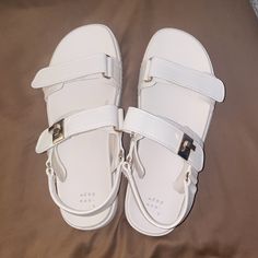 Brand New Never Worn! Size 9.5 Casual White Sandals With Adjustable Strap, Everyday Slingback Sandals With Round Toe, Everyday Slingback Sandals With Adjustable Strap And Round Toe, White Flat Sandals With Adjustable Strap, White Casual Slingback Sandals With Adjustable Strap, Casual White Slingback Sandals With Adjustable Strap, Everyday Synthetic Slingback Sandals For Spring, White Slingback Sandals With Adjustable Strap And Round Toe, Trendy White Slingback Sandals With Round Toe