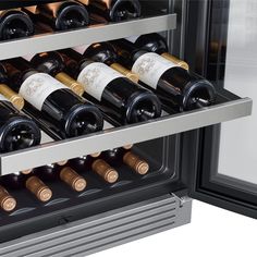 an open wine cooler with several bottles of wine in it