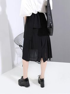 Sku CY-!60092 Material Polyester , >50%Cotton Style Loose , A-line , Empire , Original , Irregularity Feature Elasticity , Split-joint Occasion Going out , Vacation , Urban , Original Creation Seasons Spring , Summer , Autumn Type Skirts Color BLACK Size FREE SIZE Model's weight:49kg Model's height:168cm（66.14inches) Please consult the size chart we provide for this item's measurements to help you decide which size to buy.Please note: There may be 1-3cm differ due to manual measurement. INCH Waist Hips Skirt Length FREE SIZE 23.62-33.07 39.37 26.77 Black Office Skirt For Summer, Trendy Black Office Skirt, Office Bottoms With Asymmetrical Hem For Spring, Versatile Black Skirt For Fall, Non-stretch Black Skirt For Office, Non-stretch Black Office Skirt, Casual Fake Two-piece Skirt For Summer, Casual Summer Skirt With Fake Two-piece Detail, Black Asymmetrical Hem Bottoms For Work