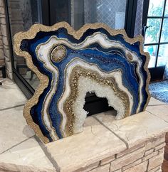 a large blue and white agate stone sculpture