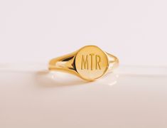 Our Signet Rings are available in sterling silver, gold filled, 10K solid gold or 14K solid gold. Please provide personalization when ordering. S H I P M E N T  | Please allow 1-2 weeks for shipment. Personalized Gold Initial Ring With Round Band, Classic Personalized Initial Ring With Round Band, Adjustable Gold Initial Ring As Personalized Gift, Adjustable Gold Initial Ring For Personalized Gift, Customizable Minimalist 14k Gold Engraved Ring, Minimalist Customizable Yellow Gold Engraved Ring, Personalized Heirloom Rose Gold Initial Ring, Customizable Gold Initial Ring, Classic Gold Initial Ring Personalized