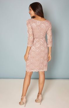 Famed for its versatile shape and smart knee length skirt, our Chloe lace maternity shift dress is our new best-seller. Now available in nude blush crafted from our premium soft stretch corded lace with a sprinkling of added shimmer for evening. The elbow length scalloped sleeves and deep V neck give our classic party dress details you’ll adore. Made to fit, shaped to flatter, a classic to trust. Feminine Knee-length Lace Dress For Wedding Guest, Elegant Blush Knee-length Dress, Elegant Knee-length Blush Dress, Elegant Pink Dress With Delicate Lace, Fitted Blush Lace Dress, Pink Knee-length Scalloped Lace Dress, Pink Scalloped Lace Knee-length Dress, Elegant Blush Lace Dress, Scalloped Sleeves