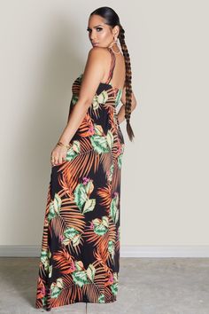 Embrace island vibes with our Tropical Print Maxi Dress. This sleeveless, floor-length dress features a vibrant tropical print and a wide fit for effortless comfort. Designed as a one-size piece, it’s perfect for a relaxed yet chic look, ideal for resort, beach days or summer outings. 85% Polyester 15% Spandex