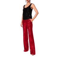 High-waisted trousers with wide legs made of a material embroidered with small sequins. The slightly elastic properties of the material ensure a perfect fit around the waist and hips. With convenient side pockets and zippered on the left side. Wear them with the Luna Obsidian Black sequin jacket to compose the perfect outfit for New Year's Eve or a Carnival party. Wear it with Luna Brilliant Ruby Sequin Blazer.  Each of the proposed sizes comes in two lengths as standard. The name of the product Glamorous Wide Leg Bottoms With Contrast Sequin, Glamorous Wide-leg Bottoms With Contrast Sequin, Spring Contrast Sequin Pants For Night Out, Contrast Sequin Pants For Night Out In Spring, Contrast Sequin Pants For Spring Night Out, Glamorous Spring Pants With Contrast Sequin, Holiday Chic Sequined Pants, Glamorous Evening Pants With Contrast Sequin, Spring Party Pants With Contrast Sequin