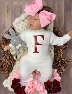 "This adorable customized outfit will have everyone in admiration of your little princess. This customized bodysuit is the perfect outfit for any occasion! Also offers an adorable large handmade ribbon bow! The bodysuit is accented with matching handmade ribbon anklets (which are removable for easy cleaning and style changes, how awesome). The anklets offer the perfect fluffy look for your little one, which we receive endless compliments on. The bodysuit is SUPER SOFT for the ultimate comfort. W Personalized Cute Onesie For First Birthday, Customizable Cute Onesie For Birthday, Cute Customizable Onesie For Birthday, Cute Pink Onesie With Name Print, Personalized Pink Onesie For Birthday, Customizable Cute Pink Onesie, Fitted Pink Onesie For Gift, Fitted Pink Onesie As A Gift, Cute Personalized Gift Sets