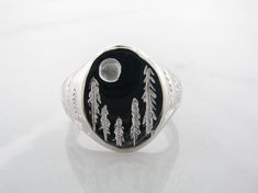 Silver Signet Ring, Forest Sizes Available 4-9Sterling Silver Silver Signet Ring, Forest - Moonlight glints off a quiet forest, where trees grow tall and wild. The full moon has risen over the treetops and the night is peaceful. This detail was all hand sculpted into a silver signet ring. Completely one of a kind piece, it is polished brightly on top and sandblasted to a matte finish on the base of the ring. Forest Moonlight, Silver Signet Ring, How To Grow Taller, The Full Moon, Sirius Black, Signet Ring, Full Moon, Fashion Rings, Trees