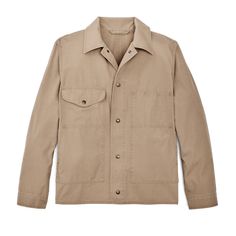 This exceptional work jacket combines an iconic fabric from our 1980s archives with the design of a favorite work jacket from the same era. The Safari Cloth fabric is a midweight cotton canvas with an exceptionally tight weave, once used for jackets on safaris for protection against aggressive insects. The material withstands abrasion and is nearly impervious to wind. The jacket design is waist length so you can access a tool belt and it won’t ride up while seated on machinery. The large back shoulder pleats are descended from our classic hunting coats and provided complete freedom of motion for climbing, working overhead, or swinging a hammer. The front features our classic work-coat pocket arrangement with flapped and slotted chest pockets and side-entry hand pockets. The front, waist ad Classic Cotton Button-up Outerwear, Single-breasted Cotton Long-sleeve Outerwear, Khaki Cotton Single Breasted Outerwear, Cotton Outerwear With Snap Buttons, Single Breasted Button-up Cotton Outerwear, Cotton Outerwear With Flap Pockets And Long Sleeves, Single Breasted Cotton Button-up Outerwear, Khaki Cotton Single-breasted Outerwear, Khaki Single-breasted Cotton Outerwear