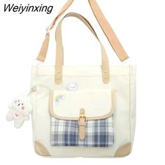 Shipping: Worldwide Express Shipping AvailableDelivery time: 🚚7-15Days Fast ShippingReturns: Fast refund,💯100% Money Back Guarantee.Handbags Type: TotesMain Material: CanvasLining Material: CanvasShape: Casual TotePlace Of Origin: SHANG HAIOrigin: Mainland ChinaHardness: HARDPattern Type: PlaidInterior: Interior Zipper PocketDecoration: NONEExterior: Solid BagOccasion: BusinessClosure Type: Zipper & HaspGender: WOMENStyle: Preppy StyleModel Number: plain weaveNumber of Handles/Straps: Single Cute Large Capacity Shoulder Bag For Daily Use, Cute Large Capacity Satchel For Everyday Use, Large Capacity Square Canvas Bag For School, Beige Shoulder Bag Satchel For School, Casual Square Shoulder Bag For School, Casual Cream Shoulder Bag For School, Cute Large Capacity Rectangular Canvas Bag, Cream Tote Shoulder Bag For School, Cream School Bag With Removable Pouch