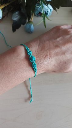 Turquoise bracelet is a nice special day gift. Christmas Gift, Wedding gift, birthday gift, bridesmaid gift, etc.... Macrame bracelet that has a classy style combined with the last fashion trend. It is comfortable to wear every day in every occasion. *Handmade, carefully crafted with passion. If you would like to have it in a special size, please do not hesitate to contact me.) *Very simple and stylish, ,*Made to order, *Comes packaged in a gift bag. *Handmade with love .... Thanks for stopping by! Turquoise Hand Wrapped Friendship Bracelet, Turquoise Bohemian Braided Bracelet For Gift, Turquoise Bohemian Braided Bracelet Gift, Turquoise Macrame Bracelets For Beach, Blue Macrame Beaded Bracelets As A Gift, Handmade Adjustable Turquoise Friendship Bracelets, Turquoise Macrame Bracelet For Beach, Adjustable Handmade Turquoise Friendship Bracelets, Turquoise Beaded Braided Bracelet Gift