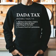 Funny Dad Definition Sweatshirt, Dad Tax Shirt, Tax Noun Shirt, Funny Dad Shirt, Fathers Day Gift, Dad Definition Tee, Best Father Shirt      Hi! Welcome to the LaTeeApparel! It's great to see you here! Our shirts are clean, high quality and soft. It is prepared quickly by our store! Enjoy your shopping! It is a pleasure for us to help you with your questions and you can reach us at any time. F I T  ∙ S I Z I N G  -->Women's sizes are narrower than the waist -->Sleeves are rolled up in some prod Gift Black Long Sleeve Shirt, Black Long Sleeve Shirt Gift, Funny Long Sleeve Tops With Text, Father's Day Shirt With Text Print And Relaxed Fit, Long Sleeve Slogan Shirt In Relaxed Fit, Funny Long Sleeve Shirt With Letter Print, Father's Day Long Sleeve Letter Print T-shirt, Father's Day Long Sleeve T-shirt With Letter Print, Long Sleeve T-shirt With Letter Print For Father's Day