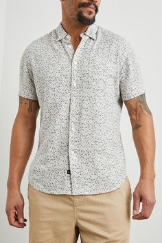 This ultra comfortable, laidback shirt is perfect for any occasion from work to weekend. Made from a lightweight linen blend, this short sleeve button-down shirt features a single patch pocket at chest.    Relaxed fit55% Linen 45% Rayon    Machine wash cold. Line dry. Do not bleach. Cool iron if needed. Spring Short Sleeve Shirt With Welt Pockets, Summer Button-up Shirt With Welt Pockets, Cotton Short Sleeve Shirt For Business Casual, Relaxed Fit Cotton Short Sleeve Shirt For Business Casual, Casual Short Sleeve Shirt With Button Closure, Short Sleeve Shirt With Button Closure For Casual Gatherings, Short Sleeve Shirt With Welt Pockets For Spring, Fitted Short Sleeve Shirt With Welt Pockets, Casual Linen Relaxed Fit Short Sleeve Shirt