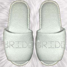 Bride Spa Slippers personalised with Rhinestone Diamantes SLIPPERS:  These are the kind of slippers you receive at a spa or hotel, made from terry towelling, designed for a one off event or as a keepsake - not for unlimited use. PERSONALISATION: This is done using rhinestone crystals.  Choose what you would like written on the slippers from the dropdown menu.  If you have selected 'other' - you can have up to 6 letters on each foot.  At checkout please enter the name you require on the slippers. Spa Slippers, Terry Towelling, Personalised Wedding, Hen Party, Womens Slippers, Hen, Personalized Wedding, Crystal Rhinestone, Slippers