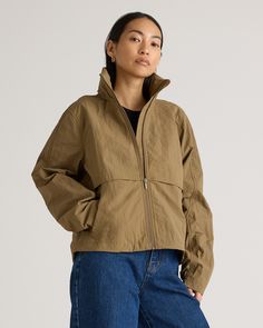 Brace the weather in style with our Water Repellent Windbreaker Jacket. Made of recycled nylon, it's windproof and breathable for all-day comfort and long-lasting durability. And since it’s light enough to stash in your bag, you’ll be protected wherever you travel.  | Quince | Women's Water Repellent Windbreaker Jacket in Praline, Size XL, Nylon Midweight Recycled Polyester Windbreaker For Hiking, Lightweight Nylon Windbreaker, Functional Style, Brown Nylon Outdoor Outerwear, Functional Moisture-wicking Windbreaker For Hiking, Moisture-wicking Nylon Windbreaker For Hiking, Windbreaker Jacket Women, Windbreaker Jacket, Quince, Water Repellent