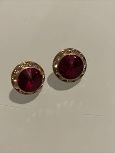 Vintage Pierced Earrings Gold Tone Clear Red Rhinestones. Condition is Pre-owned. Shipped with USPS First Class. Red Round Clip-on Earrings For Anniversary, Red Round Clip-on Earrings, Red Round Earrings With Sparkling Stones, Red Rhinestone Earrings For Formal Occasions, Red Crystal Round Earrings, Formal Red Rhinestone Earrings, Red Bling Earrings For Party, Red Rhinestone, Pierced Earrings