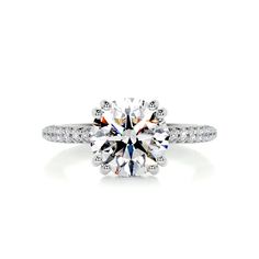 a diamond engagement ring with pave set shoulders