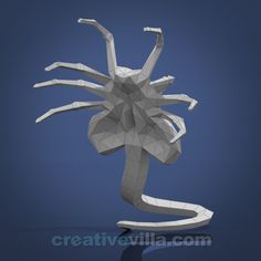 an abstract 3d image of a large spider on a blue background with the caption creativevillia com