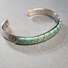 Vintage Sterling Silver Cuff Bracelet with Light Turquoise Blue Inlay, Beautiful Birthday Gift 925 Silver Jewelry for Her ► FEATURES * 2.5 inches wide inner dimension, fits an average woman's wrist. * Stamped "925" on the inside * Southwestern tribal style  * 8mm wide  This vintage bracelet is from around 2000 or earlier. It's in great condition. It may have some antiqued and tarnishing. It's been in storage all of these years. I'll give it a light polish before shipping. Message me if you have Turquoise Sterling Silver Bracelet For Anniversary, Turquoise Sterling Silver Bracelets For Anniversary, Blue Sterling Silver Bracelet, Stamped 925, Gift, Blue Sterling Silver Bracelet Gift, Adjustable Blue Cuff Bracelet Stamped 925, Blue Bracelet 925 Silver As A Gift, Southwestern Blue Cuff Bracelet As Gift, Blue Sterling Silver Round Cuff Bracelet, Southwestern Style Turquoise Bangle As A Gift