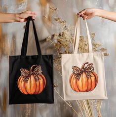 These awesome, shoulder carrying, 100% cotton, canvas tote bags feature a simple pumpkin with a leopard print bow on top, on the front, and measure 15"x16" making it perfect for everyday use.  The bag features 20" handles (made from the same canvas), making it easy to carry even with a week's worth of shopping, and are durable enough to last for years.  The tote is available in color choices or natural or black. Use these Fall lover, medium-sized totes as an eco-friendly option to carry grocery items, store bought good, books, dance shoes, gym items, or as an overnight bag.  They also make a great end of year teacher or student gift! *100% cotton canvas *Heavy fabric (12 oz/yd² (406.9 g/m *Sewn-in label CARE INSTRUCTIONS - Hand wash; Tumble dry: low heat; Non-chlorine: bleach as needed; Do Brown Cotton Bags For Fall, Brown Canvas Bag For Fall, Rectangular Canvas Bags For Fall, Canvas Shopping Bags For Fall, Fall Canvas Shopping Bags, Cheetah Print Pumpkin, Bow Pumpkin, Gym Items, Shopping Tote Bags