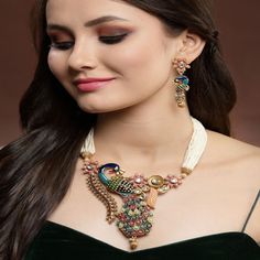 ABOUT JEWELRY We Present Latest Fashion Antique Fashion Peacock Necklace Jewelry set for women. Necklace set Jewelry Decoration with High Quality Kundan Stone, Pearls material. Stunning Party wear, Wedding Neckwear Piece , ethnic wear jewelry for Women. Gold Plated multicolor  Pearl and atone Studded Bridal Wedding Necklace jewelry for Brides and Bridesmaids. Our products are skin-friendly & with love to reach your heart. CONTENT & DIMENSION::- The package includes 1 Necklace,  1 Pair Earrings PACKAGING::- This Jewelry will come nicely wrapped in a bubble wrapped in a white box preventing any kind of Damage. OCCASION::- Gracefully Necklace Jewelry pair with Designer Saree, suit, Wedding Lehenga, Indian Outfit or any Indo-western outfit to enhance your look with Indian Kundan Jewelry set. P Festive Bollywood Jewelry Sets With Peacock Design, Festive Peacock Design Jewelry Sets, Festive Jewelry Sets With Peacock Design For Diwali, Bollywood Style Peacock Design Jewelry Sets For Festive Occasions, Festive Peacock Design Jewelry Sets For Diwali, Diwali Festive Jewelry Sets With Peacock Design, Festive Multicolor Peacock Jewelry Sets, Festive Multicolor Peacock Design Jewelry Sets, Elegant Sets With Peacock Design For Diwali