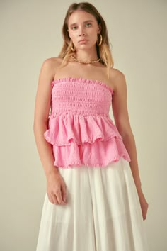 Delicate and dainty. Sweet and sassy. You'll be all of that and more in this Lace Smocked Knit Ruffled Tube Top. A smocked bust with textured knit and lace trim gives this tube top an elevated look. But the real showstopper is the ruffle detail. Three tiers of cascading ruffles give this tube top a flirty and fun finish. Textured knit Lace trim Smocked bust Layered ruffles Tube top Non sheer Lining Hand wash cold Do not bleach Do not tumble dry Iron low Shell: 97% Polyester 3% Spandex Lining: 94 Pink Ruffle Top, Ruffle Tube Top, Wish List Clothes, Birthday Outfit Ideas, Knit Loungewear, Strapless Bodycon Dress, Basic Fashion, Cascading Ruffles, Knit Lace